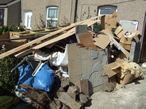 Professional team conducting garage clearance